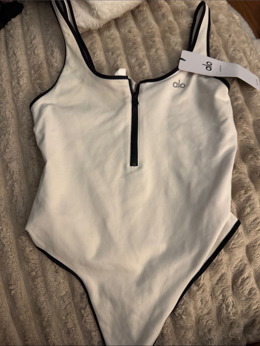 ALO Yoga White One-Piece with Black Trim and Front Zip